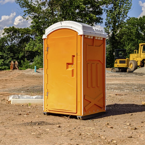 how often are the portable restrooms cleaned and serviced during a rental period in Four Corners Florida